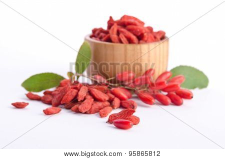 barberries and goji berries isolated on white background