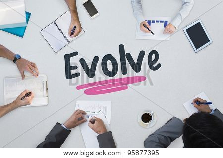 The word evolve against business meeting