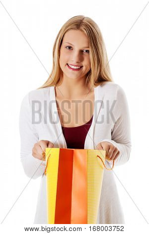 Young beautiful woman with some shopping bags.