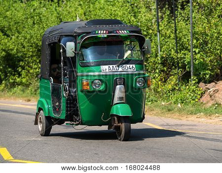 Mirissa, Sri Lanka - January 07, 2017: Tuk-tuk Moto Taxi On The Street. Famous Thai Moto-taxi Called