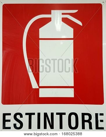 signal sign against fire extinguisher: the danger