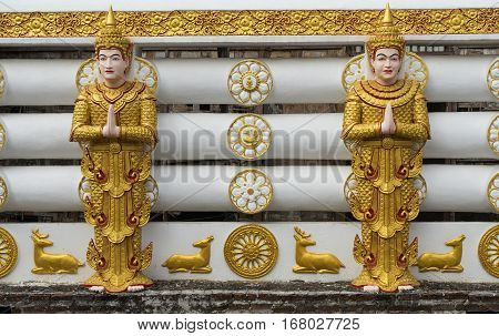 Temple wall at Wang Wiwekaram temple Kanchanaburi Thailand.