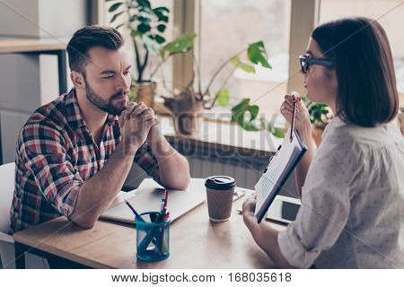 Young Happy Partners Discussing Diagrama Of Financial Growth