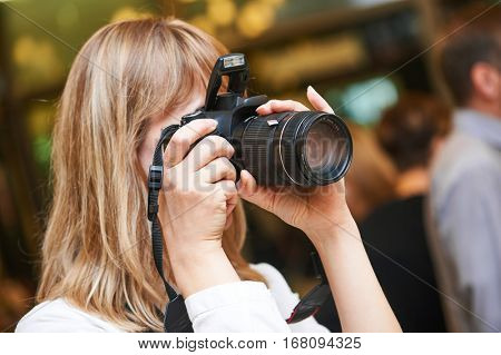 photographer woman at work indoors