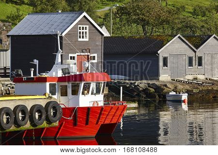 Norwefian fjord village with harbor. Hardanger road route. Jondal. Travel background