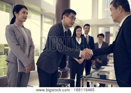 Business Partners Introductionary Handshake Bow
