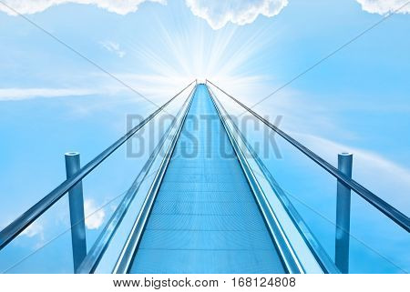 Stairway to heaven with blue sky clouds and god sun light. Religion concept