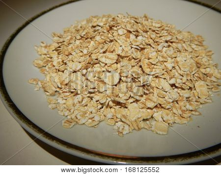 Oat Flakes N A Small White Plate