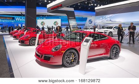 DETROIT MI/USA - JANUARY 12 2015: Porsche 911 Carrera 4 GTS Boxster GTS Cayman GTS Panamera GTS cars at the North American International Auto Show (NAIAS) one of the most influential car shows in the world each year.