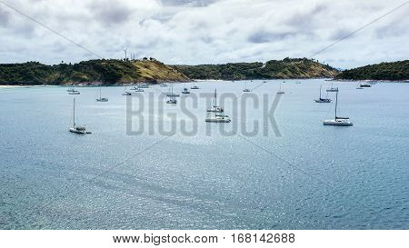 Sailboats in the bay. Yachts at the pier in bad weather. Rain season