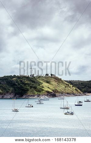Sailboats in the bay. Yachts at the pier in bad weather. Rain season