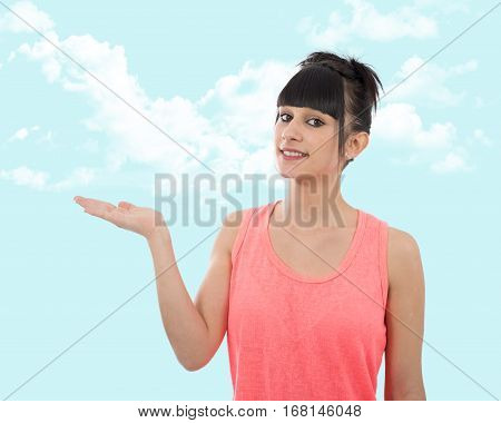 young brunette woman presenting copy space on her palm