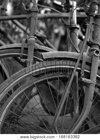 ABSTRACT SHOT OF OLD RUSTY BICYCLE PARTS