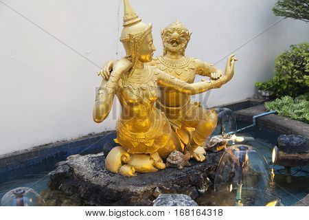 The evil Buddhist statue costs in the light of setting the sun