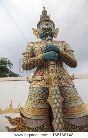 The evil Buddhist statue costs in the light of setting the sun
