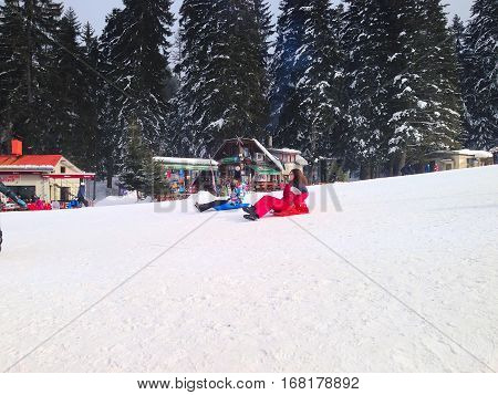 Borovets, Bulgaria - January 30, 2017: People sledging at ski resort Borovets