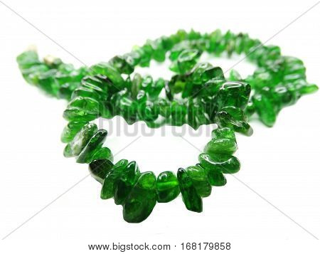 chrome diopside gemstone beads isolated on white background
