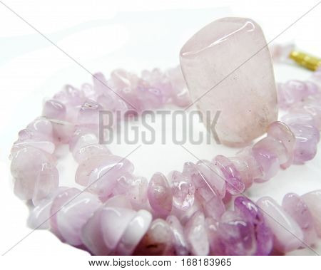kunzite semigem beads isolated on white background