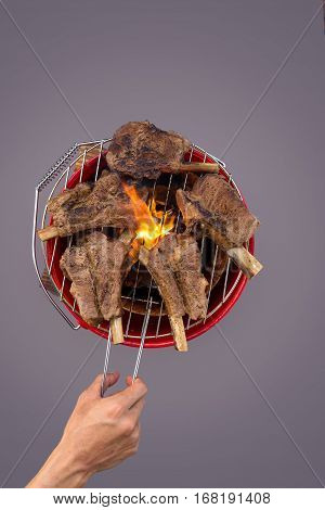 Roast short pork ribs whith gas burner flame burns