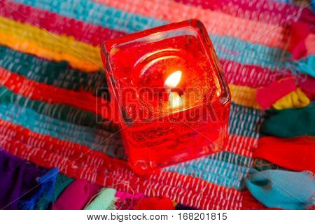 red yellow orange white  blue candle .