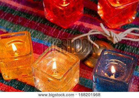 red yellow orange white  blue candle .
