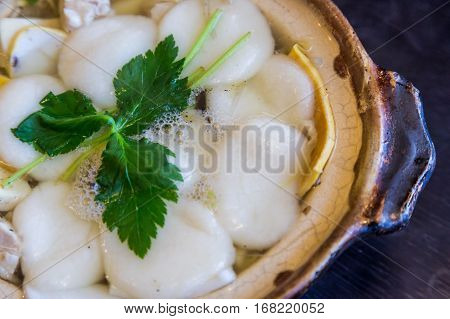 Traditional Shimabara Guzoni - Soup With Rice Cake And Seafood