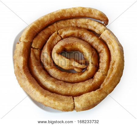 a plate with churros porras typical Spanish sweet on a white background