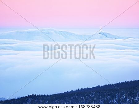 Winter Mountain Peak With Observatory Above Mist