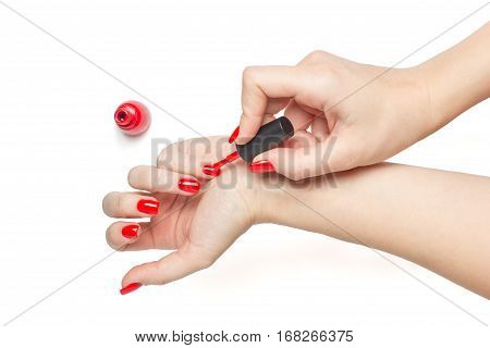Manicure - Beautiful manicured woman's nails with red nail polish on white background