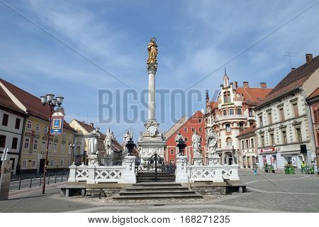 MARIBOR, SLOVENIA - APRIL 03: Plague column at Main Square of the city of Maribor in Slovenia, Europe. Historical religious sculpture, April 03, 2016.