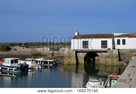 Loix France - september 26 2016 : the picturesque water mill in autumn