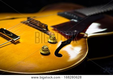 Jazz Arch top guitar on a black background