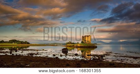Stalker Castle in sunrise light Highlands Scotland