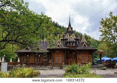 Wooden building restaurant in Yaremche Ivano-Frankivska oblast Ukraine. Carpathian Mountains.