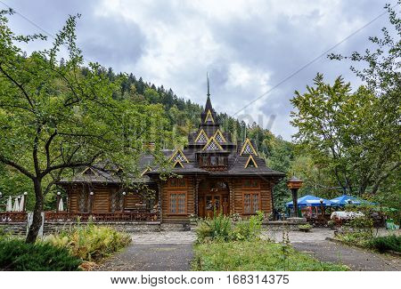 Wooden building restaurant in Yaremche Ivano-Frankivska oblast Ukraine. Carpathian Mountains.