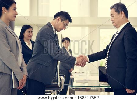 Business Partners Introductionary Handshake Bow