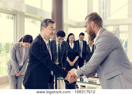 Business Partners Introductionary Handshake Bow