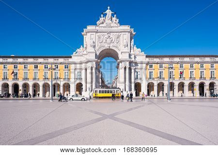 Lisbon Portugal - November 20 2013: People walking at the Commerce Square (Praca de Commercio).