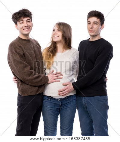 Young Pregnant Woman Posing With Two Young Man