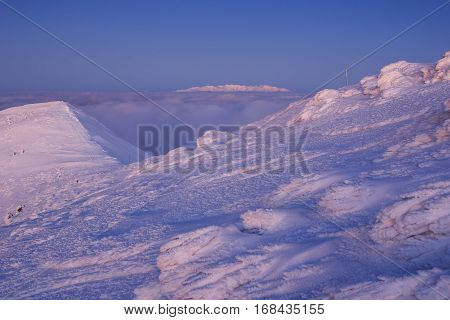 Amazing Foggy Sunset At Mountain Peak During Cold Winter Day In Mala Fatra, Slovakia