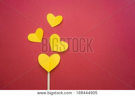 Hearts made by hands as a gift for Valentine`s day. Fall in love heart