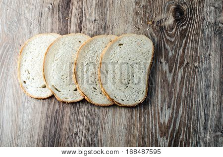 Fresh bread on wood background Apartment will post pictures of bread on a wooden Board.