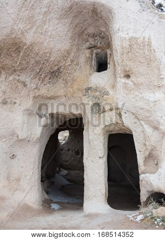 Ancient cave entrance In Turkey Kappadokia mauntians
