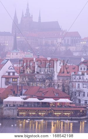 Panorama of an old Prague, bridges and embankment of Vitava river, Czechia in a night