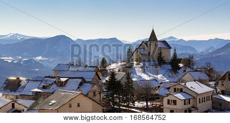 Panoramic view of Saint-Apollinaire village in winter. Hautes-Alpes French Alps France