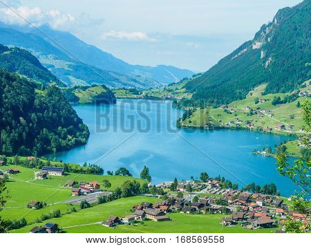 High view point lake Lungern and village from Brunig Pass Switzerland.