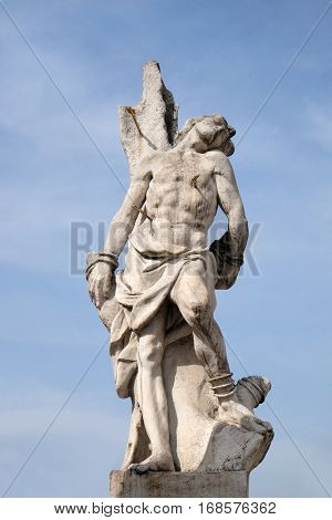 MARIBOR, SLOVENIA - APRIL 03: Saint Sebastian statue, Plague column at Main Square of the city of Maribor in Slovenia, Europe. Historical religious sculpture, April 03, 2016.