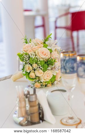 beautiful wedding bouquet lies on the table