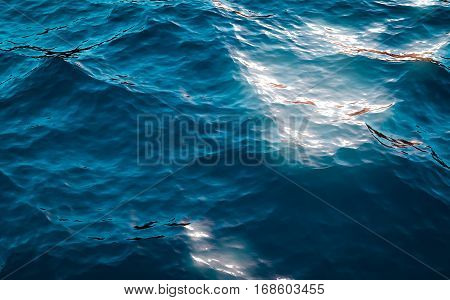 An ocean sunset shorebreak. Big beautiful high contrast sunrise wave swirling. Bright sun shining on blue sky with colorful clouds.