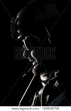 United states Marine Corps special operations command Marsoc raider. Contour backlit studio shot of Marine Special Operator black background